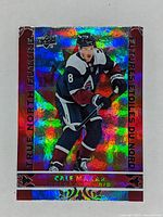 Front side of the holographic 2024-25 Upper Deck Tim Hortons Cale Makar hockey card with True North Futures design and colorful foil.