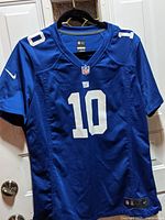 Front view of the blue Eli Manning New York Giants jersey. Shows number 10 on chest and shoulders.