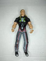 Front view of the Shawn Michaels wrestling figure showing detailed outfit and face.