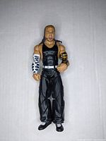 Front view of Jeff Hardy 2005 Jakks WWF Wrestling action figure with black outfit and detailed arm sleeves.