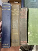 Photo of five hardcover books with titles visible: Uncensored Recollections, Schools and Masters of Sculpture, The Devil's Paw, Syndle Overing.