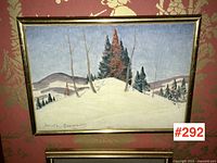 Frontal view of entire painting and frame against patterned wallpaper