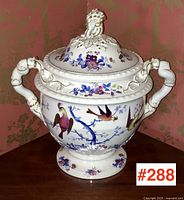 Full view of tureen and lid showing overall form, handles and painted decoration