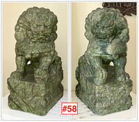 Front and back view of both Foo dog sculptures on white surface against neutral wall.