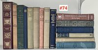 Full lot of 13 assorted vintage books standing upright showing spines and titles