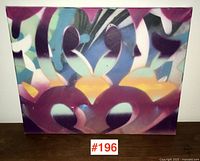 Front view of the abstract graffiti artwork on canvas with vibrant spray painted colors in an urban graffiti style.