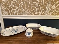 Overview of the 4-piece vintage Noritake Progression porcelain china set including serving dishes, platter and sugar bowl.