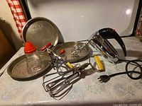 All items overview including electric mixer, manual mixer, pie pans, shaker and pastry blender