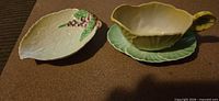 Full set showing gravy boat on saucer and separate leaf dish