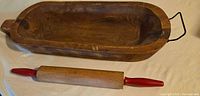 dough trencher and rolling pin full view