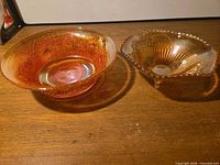 Top view of both amber iridescent carnival glass bowls