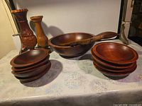 Full lot: large bowl, two stacks of small bowls, servers inside large bowl, two candlesticks