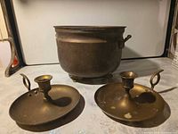 Pot planter and two chambersticks overview