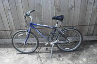 Side profile of the full bicycle showing the frame, wheels, seat, and handlebars.