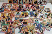 Collection of 1991 Starline Hollywood Walk Of Fame trading cards, spread out showing various celebrity images and colorful borders