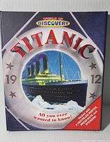 Front cover of the hardcover book showing the Titanic ship illustration and title with publishing year 1912 and promotional text.