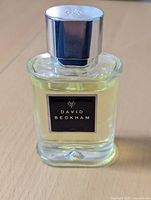 Front view of David Beckham cologne bottle showing label and cap.