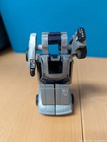 Front view of the Camshaft Omnibot figure showing wear and missing pieces.