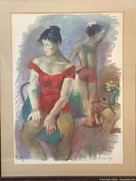 Close-up of lithograph artwork showing details of two dancers, the seated female in red dress and male dancer in red shorts.