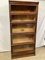 Front view of assembled five sections with top and base