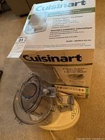 Cuisinart Ice Cream Maker box and appliance visible, showing model and features on box