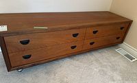 Front view showing two drawers with black recessed pulls