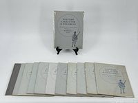 All 12 Military Collector & Historian journals shown in group with one standing on display stand