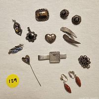 Top view of all jewelry items displayed on neutral background