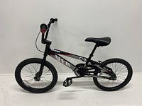 Full side view of the black DYNO VFR BMX bicycle showing frame, wheels, and seat.