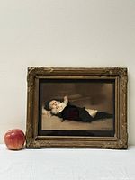 Full front view of the framed baby giclee print with an apple for scale to show size and condition.