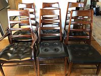 Front view of all six chairs showing overall design and condition