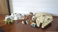 Overview of all toys including Millennium Falcon, Hoth base, creatures, figures and Landspeeder