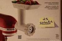 Photo of KitchenAid food grinder attachment box showing product image and usage details.