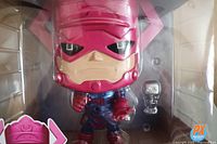 Close-up of the Galactus Funko POP! figure showing detailed face and small Silver Surfer figure inside the box.