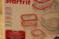 Close-up image of the product packaging showing container sizes and airtight, liquid-tight, microwave/freezer/dishwasher safe features.
