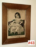 Front view of the framed lithograph titled "The Only Daughter" showing the entire piece hanging on a wall.