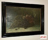 Frontal view of the Victorian still life painting on canvas featuring fruits and a goblet in black and gold wood frame.