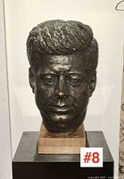 Front view of JFK bust showing detailed facial features and hair texture.