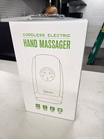 View of front of box showing product name and basic black line art of device.