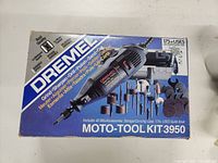 Box lid showing Dremel Moto-Tool Kit 3950 label and illustration.