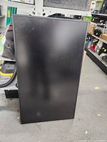 Front view of Samsung 46-inch screen TV/monitor showing black bezel and screen.