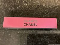 Top view of the pink rectangular box showing Chanel Chance Eau de Toilette Spray, 1.14 fl oz, 33 ml volume.