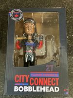 Front view of Vladimir Guerrero Jr bobble head in original box showing figure and packaging details.