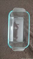 Top down photo of the Pyrex rectangular baking dish showing the clear glass and handles.
