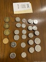 Overview of all coins laid out on table