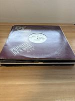 Stack of 10 12-inch vinyl singles with visible Foxy Brown Def Jam Recordings sleeve showing