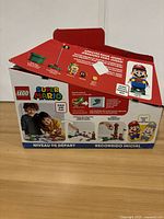 Front and side view of the sealed LEGO Super Mario Starter Course box showing product images and branding.