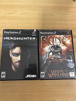 Front cover view of Headhunter and Rune Viking Warlord PlayStation 2 game cases