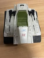 Front view of the 1986 GI Joe Sgt. Slaughter's Triple T vehicle showing cockpit, twin guns, and tank treads.