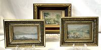 Three miniature George Baxter prints in gilded frames arranged on clear stands